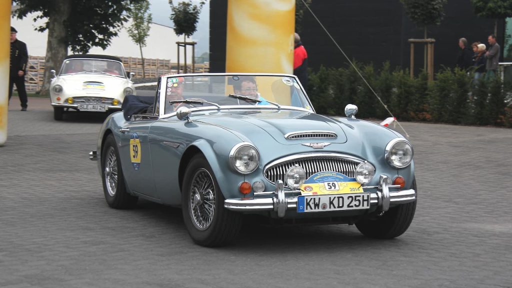 Light blue Austin-Healey 3000 with racing number 59 and German registration KW-KD25H at classic car rally event